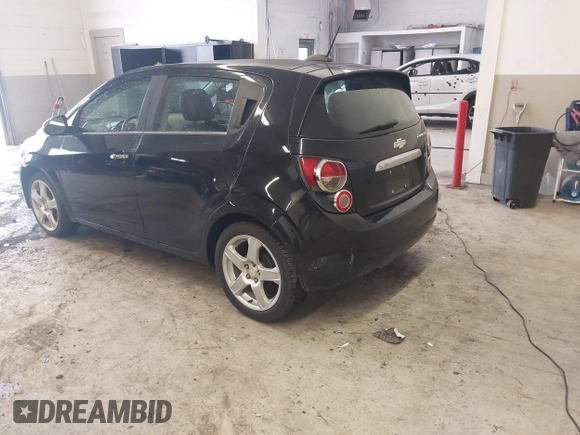 2016 Chevrolet Sonic LTZ z VIN 1G1JE6SB3G4150803, wystawiony jako IAAI lot #42007951 z przebiegiem 124 811 mil mil oraz . Historia ofert i sprzedaży dostępna na DreamBid. Obrazek 3.