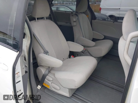 2012 Toyota Sienna LE AAS with VIN 5TDKK3DC3CS208853, listed as a IAAI auction lot 42205012 with 197,286 mi miles. Bid and sale history available at carsss.com. Image 8.