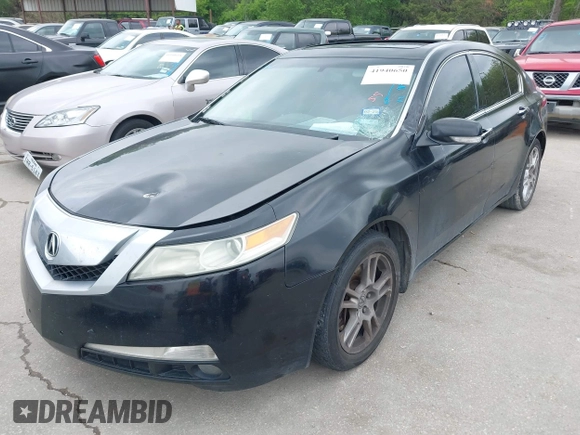 2009 Acura TL Tech with VIN 19UUA86579A015247, listed as a IAAI auction lot 41940650 with 227,334 mi miles. Bid and sale history available at carsss.com. Image 2.