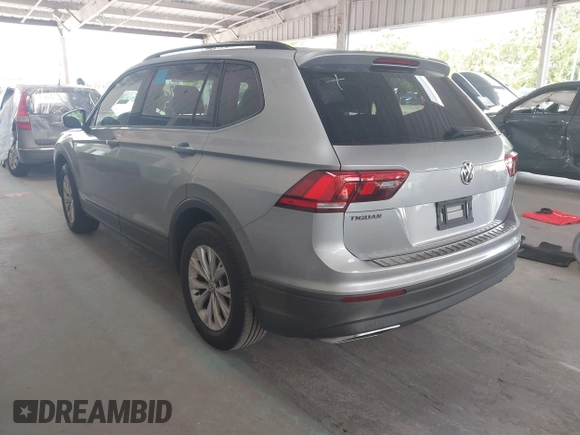 2019 Volkswagen Tiguan S with VIN 3VV1B7AX6KM189497, listed as a IAAI auction lot 42669313 with 236,719 mi miles and . Bid and sale history available at DreamBid. Image 3.