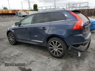 2015 Volvo XC60 T5 Drive-E Premier с VIN YV440MDK0F2636982, выставлен на аукционе Copart как лот 53581325 с пробегом 108 660 миль миль и Списание • Salvage title. История ставок и продаж доступна на DreamBid. Изображение 2.