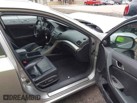 2010 Acura TSX with VIN JH4CU2F64AC031288, listed as a IAAI auction lot 42023406 with 144,192 mi miles. Bid and sale history available at carsss.com. Image 5.