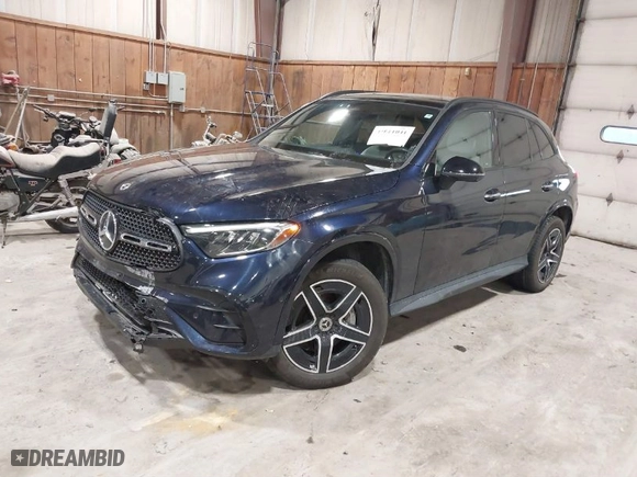 2023 Mercedes-Benz GLC with VIN W1NKM4HB9PF028986, listed as a IAAI auction lot 41611041 with 22,617 mi miles. Bid and sale history available at carsss.com. Image 2.