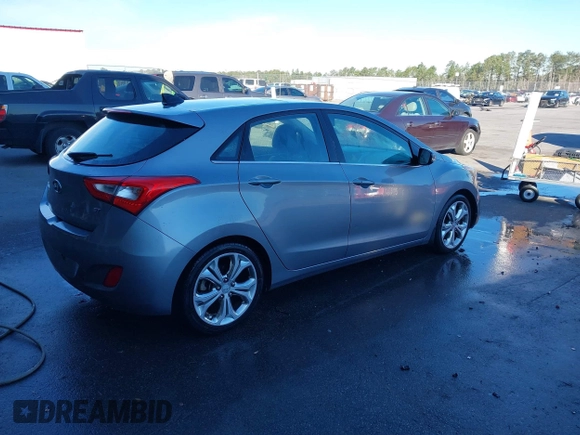 2014 Hyundai Elantra GT with VIN KMHD35LH1EU162934, listed as a IAAI auction lot 41705866 with 121,709 mi miles. Bid and sale history available at carsss.com. Image 4.
