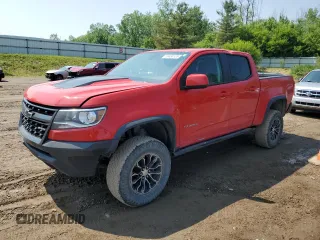 2018 Chevrolet Colorado 4WD ZR2 z VIN 1GCGTEEN5J1250353, wystawiony jako Copart lot #59484125 z przebiegiem 144 947 mil mil oraz Czysty tytuł • Clean title. Historia ofert i sprzedaży dostępna na DreamBid. Obrazek 1.