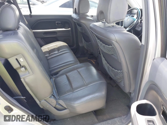 2008 Honda Pilot EX-L with VIN 5FNYF28528B027047, listed as a IAAI auction lot 42692510 with 251,260 mi miles and . Bid and sale history available at DreamBid. Image 8.