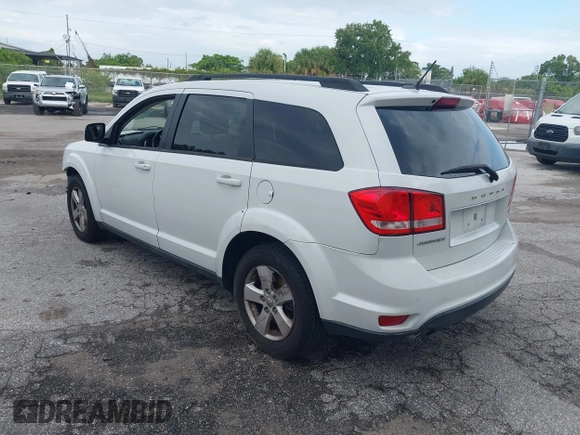 2012 Dodge Journey SXT with VIN 3C4PDCBG3CT331693, listed as a IAAI auction lot 42624751 with 165,480 mi miles and . Bid and sale history available at DreamBid. Image 3.