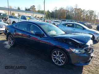 2015 Mazda 6 i Grand Touring with VIN JM1GJ1W55F1183824, listed as a IAAI auction lot 40840126 with 132,773 mi miles. Bid and sale history available at carsss.com. Image 1.