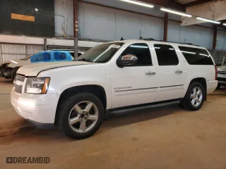 2014 Chevrolet Suburban LTZ with VIN 1GNSCKE0XER127997, listed as a Copart auction lot 42411525 with 228,690 mi miles and Salvage Title. Bid and sale history available at carsss.com. Image 1.