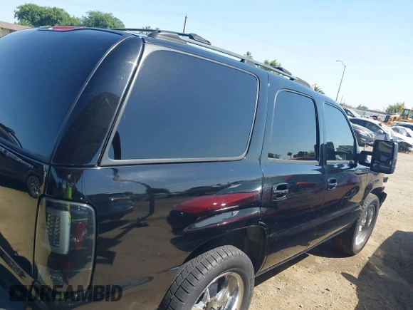 2003 Chevrolet Tahoe LS z VIN 1GNEC13T53J331221, wystawiony jako IAAI lot #42422243 z przebiegiem Nie podano mil oraz . Historia ofert i sprzedaży dostępna na DreamBid. Obrazek 14.