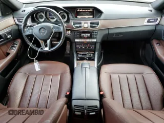 2015 Mercedes-Benz E 350 Luxury with VIN WDDHH8JB0FB134830, listed as a Copart auction lot 70855934 with 106,717 mi miles and Salvage title. Bid and sale history available at DreamBid. Image 8.