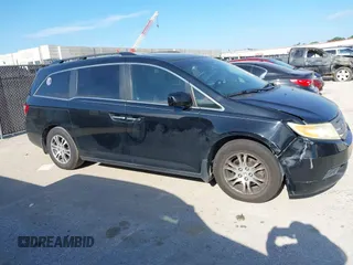 2012 Honda Odyssey EX-L z VIN 5FNRL5H63CB046447, wystawiony jako IAAI lot #42578775 z przebiegiem 247 852 mil mil oraz . Historia ofert i sprzedaży dostępna na DreamBid. Obrazek 13.