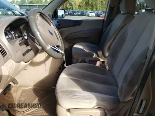 2007 Kia Sedona EX with VIN KNDMB233776121810, listed as a Copart auction lot 77229344 with 133,193 mi miles and Salvage Title. Bid and sale history available at carsss.com. Image 7.