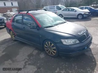 2003 Mitsubishi Lancer OZ-Rally with VIN JA3AJ86E03U078826, listed as a IAAI auction lot 41700333 with 119,656 mi miles. Bid and sale history available at carsss.com. Image 1.