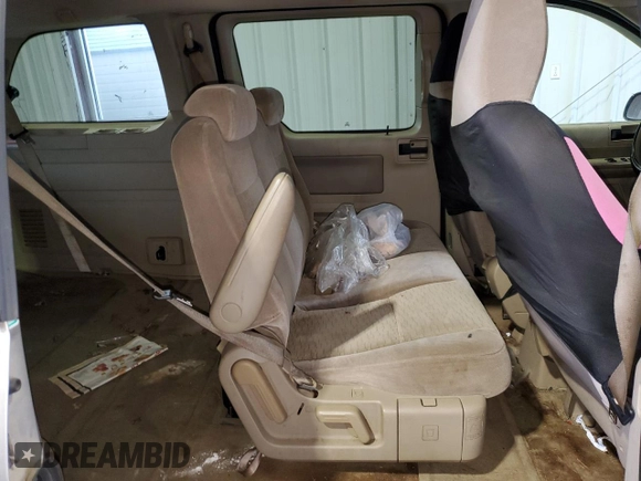 2004 Ford Freestar SE z VIN 2FMZA51634BA72234, wystawiony jako Copart lot #85695414 z przebiegiem Nie podano mil oraz Szkoda całkowita • Salvage title. Historia ofert i sprzedaży dostępna na DreamBid. Obrazek 12.