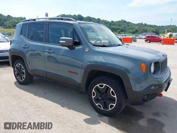 2015 Jeep Renegade Trailhawk with VIN ZACCJBCT8FPB33586, listed as a IAAI auction lot 42590207 with 127,168 mi miles and . Bid and sale history available at DreamBid. Image 1.