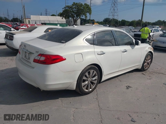 2012 Infiniti M with VIN JN1BY1AP0CM334130, listed as a IAAI auction lot 42096106 with 137,460 mi miles and . Bid and sale history available at DreamBid. Image 4.