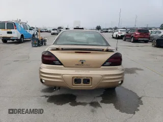 1999 Pontiac Grand Am SE2 with VIN 1G2NE52T2XM869508, listed as a Copart auction lot 44443755 with 119,769 mi miles and Salvage Title. Bid and sale history available at carsss.com. Image 6.