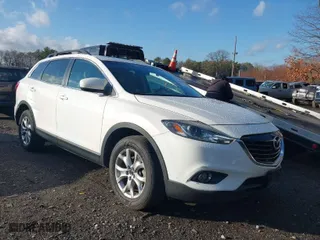 2015 Mazda CX-9 Touring with VIN JM3TB3CV0F0465622, listed as a IAAI auction lot 40955697 with 29,792 mi miles. Bid and sale history available at carsss.com. Image 1.