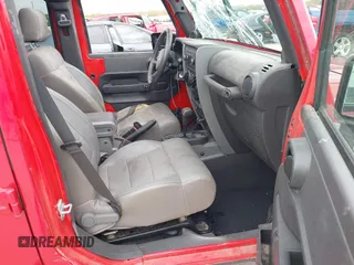 2007 Jeep Wrangler Unlimited X with VIN 1J4GB39157L108803, listed as a IAAI auction lot 41894435 with 46,654 mi miles and . Bid and sale history available at DreamBid. Image 5.