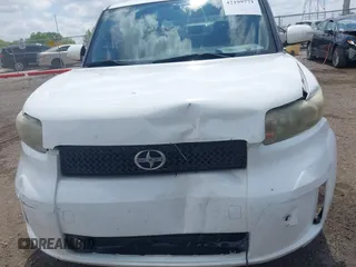 2009 Scion xB z VIN JTLKE50E791072263, wystawiony jako IAAI lot #42199771 z przebiegiem 164 071 mil mil oraz . Historia ofert i sprzedaży dostępna na DreamBid. Obrazek 12.