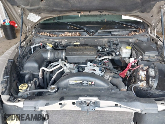 2005 Dodge Dakota Laramie with VIN 1D7HW58N15S159061, listed as a IAAI auction lot 41898306 with 114,288 mi miles and . Bid and sale history available at DreamBid. Image 10.