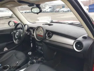 2013 MINI Cooper Hardtop with VIN WMWSU3C54DT371783, listed as a IAAI auction lot 41131978 with 130,053 mi miles. Bid and sale history available at carsss.com. Image 5.