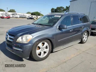 2012 Mercedes-Benz GL 450 z VIN 4JGBF7BE6CA791895, wystawiony jako Copart lot #56251895 z przebiegiem 153 283 mil mil oraz Czysty tytuł • Clean title. Historia ofert i sprzedaży dostępna na DreamBid. Obrazek 1.