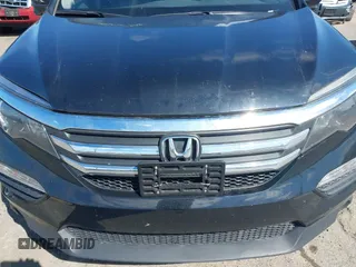 2016 Honda Pilot EX-L with VIN 5FNYF5H57GB023852, listed as a IAAI auction lot 41811412 with 151,707 mi miles and . Bid and sale history available at DreamBid. Image 6.