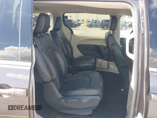 2023 Chrysler Pacifica Hybrid Touring L with VIN 2C4RC1L74PR579782, listed as a IAAI auction lot 42487390 with Not provided miles and . Bid and sale history available at DreamBid. Image 8.