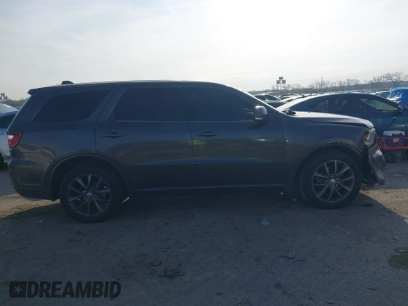 2015 Dodge Durango R/T with VIN 1C4SDHCT8FC833943, listed as a IAAI auction lot 41898447 with 209,999 mi miles and . Bid and sale history available at DreamBid. Image 13.