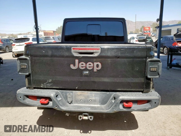 2020 Jeep Gladiator Rubicon с VIN 1C6JJTBG5LL116138, выставлен на аукционе Copart как лот 58061265 с пробегом 50 274 миль миль и Списание • Salvage title. История ставок и продаж доступна на DreamBid. Изображение 6.