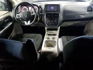 2016 Dodge Grand Caravan SXT with VIN 2C4RDGCG6GR273330, listed as a Copart auction lot 55937635 with 106,688 mi miles and Clean Title. Bid and sale history available at DreamBid. Image 8.