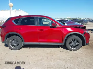 2020 Mazda CX-5 Touring with VIN JM3KFACM1L0756864, listed as a IAAI auction lot 41761131 with 16,646 mi miles and . Bid and sale history available at carsss.com. Image 13.