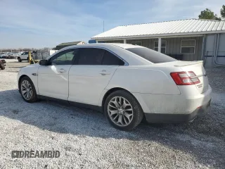 2015 Ford Taurus Limited with VIN 1FAHP2F86FG125680, listed as a Copart auction lot 42934535 with 122,156 mi miles and Salvage Title. Bid and sale history available at DreamBid. Image 2.