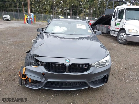 2015 BMW M4 with VIN WBS3R9C55FK333704, listed as a IAAI auction lot 40552025 with 1 mi miles. Bid and sale history available at carsss.com. Image 12.