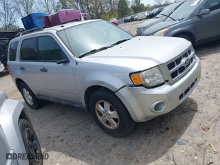 2011 Ford Escape XLT with VIN 1FMCU9D72BKB26103, listed as a IAAI auction lot 41927641 with 205,543 mi miles. Bid and sale history available at carsss.com. Image 1.