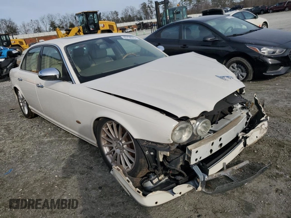 2007 Jaguar XJ with VIN SAJWA71B17SH15873, listed as a Copart auction lot 45739045 with 163,029 mi miles and Salvage Title. Bid and sale history available at carsss.com. Image 4.