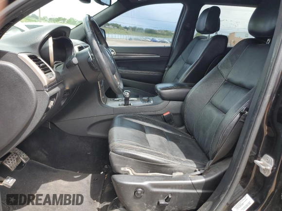 2014 Jeep Grand Cherokee Limited z VIN 1C4RJFBT6EC184557, wystawiony jako Copart lot #57657095 z przebiegiem 157 688 mil mil oraz Szkoda całkowita • Salvage title. Historia ofert i sprzedaży dostępna na DreamBid. Obrazek 7.