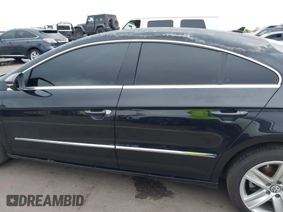 2013 Volkswagen CC Sport with VIN WVWBP7AN6DE504679, listed as a IAAI auction lot 42034362 with 148,527 mi miles. Bid and sale history available at carsss.com. Image 15.