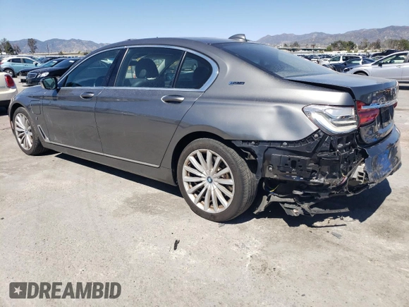 2018 BMW 7 Series 740e xDrive with VIN WBA7J2C55JG938385, listed as a Copart auction lot 49109985 with 81,567 mi miles and Salvage Title. Bid and sale history available at DreamBid. Image 2.