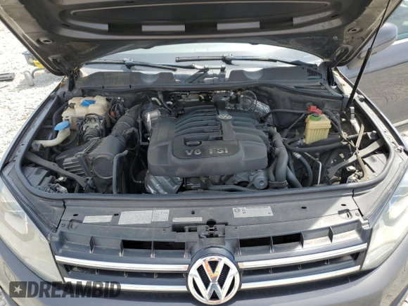 2013 Volkswagen Touareg Lux with VIN WVGEF9BP8DD002947, listed as a Copart auction lot 52590164 with 144,831 mi miles and Salvage Title. Bid and sale history available at DreamBid. Image 13.
