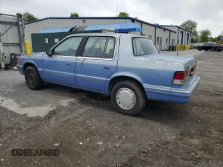 1991 Plymouth Acclaim z VIN 1P3XA4633MF523214, wystawiony jako Copart lot #55908665 z przebiegiem 90 332 mil mil oraz Tytuł czysty. Historia ofert i sprzedaży dostępna na DreamBid. Obrazek 2.