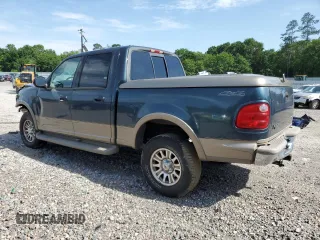 2001 Ford F-150 XLT z VIN 1FTRW08L21KB37421, wystawiony jako Copart lot #57114015 z przebiegiem 288 942 mil mil oraz Szkoda całkowita • Salvage title. Historia ofert i sprzedaży dostępna na DreamBid. Obrazek 2.