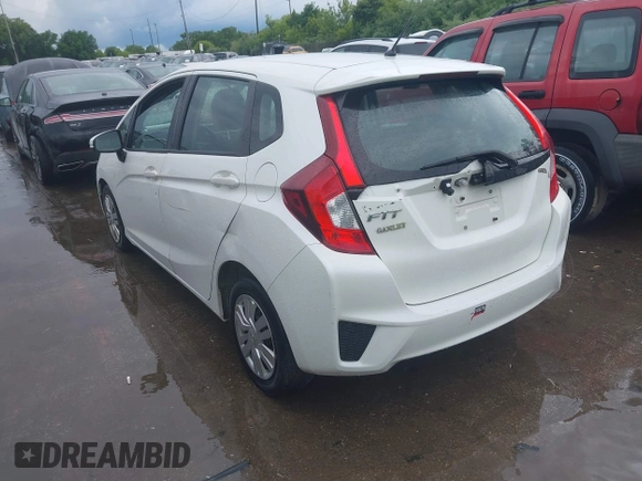 2015 Honda Fit LX with VIN 3HGGK5H52FM775462, listed as a IAAI auction lot 42549634 with 167,391 mi miles and . Bid and sale history available at DreamBid. Image 3.