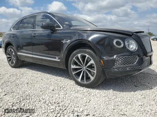 2017 Bentley Bentayga W12 with VIN SJAAC2ZV5HC013960, listed as a Copart auction lot 53608545 with 34,698 mi miles and Salvage Title. Bid and sale history available at carsss.com. Image 4.