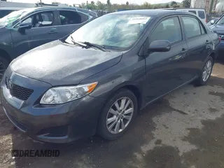 2009 Toyota Corolla with VIN 1NXBU40E79Z042778, listed as a IAAI auction lot 41928062 with 201,409 mi miles. Bid and sale history available at carsss.com. Image 2.