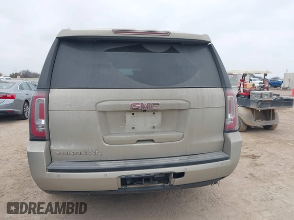 2015 GMC Yukon XL SLE z VIN 1GKS1GKC1FR155056, wystawiony jako IAAI lot #41517607 z przebiegiem 174 634 mil mil oraz . Historia ofert i sprzedaży dostępna na DreamBid. Obrazek 16.