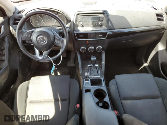 2016 Mazda CX-5 Sport with VIN JM3KE4BYXG0702655, listed as a Copart auction lot 63120205 with 64,403 mi miles and Salvage title. Bid and sale history available at DreamBid. Image 8.