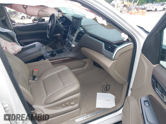 2019 Chevrolet Tahoe LT with VIN 1GNSKBKC3KR144850, listed as a IAAI auction lot 42420199 with Not provided miles and . Bid and sale history available at DreamBid. Image 5.